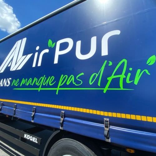 Réalisation Lettrage sur bâche de remorque Moselle